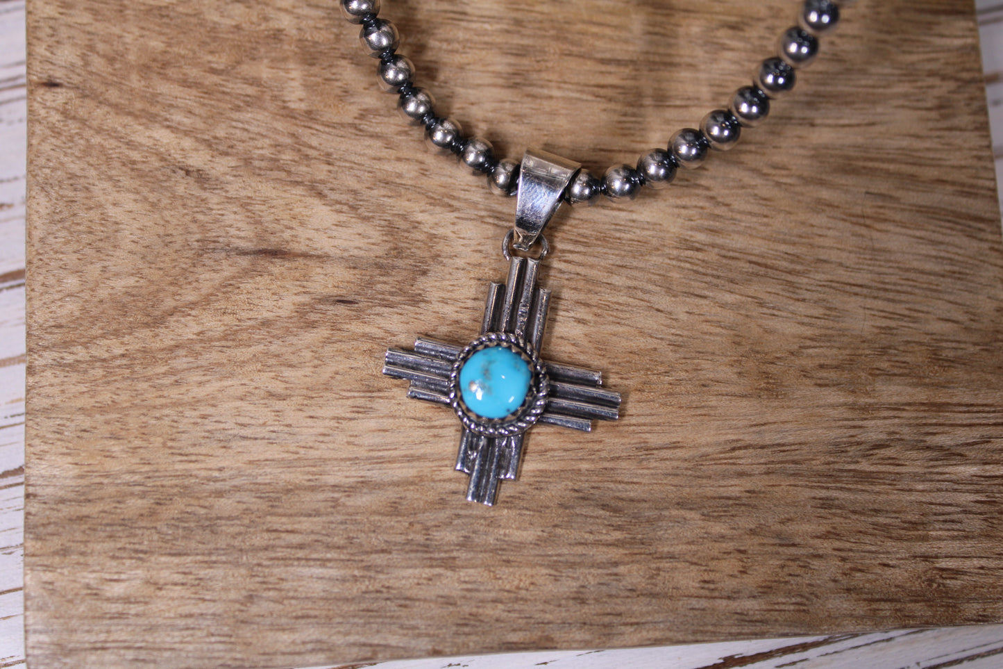 Raymond Yazzie Navajo Sterling Silver Kingman Turquoise Zia Pendant